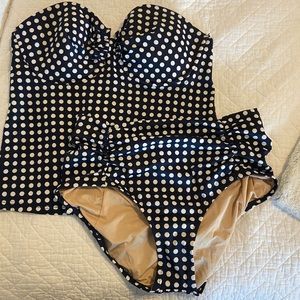 NWT 2 piece J.Crew bathing suit. Top is size 8 with D Cups. Bottoms are Size M.